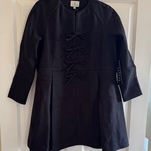 Tuckernuck black dress with bow accents. Beautiful wool dress.